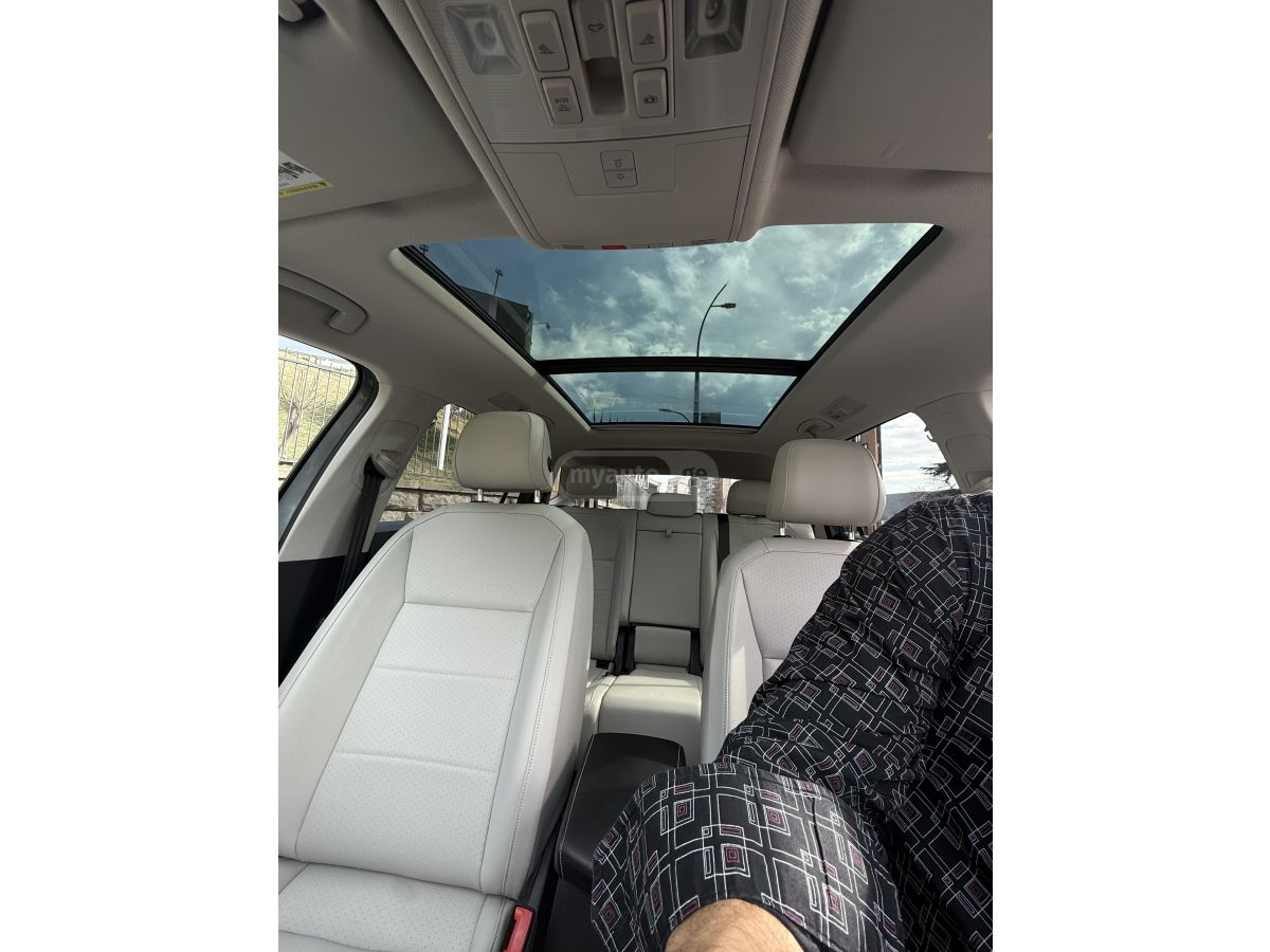 Volkswagen Tiguan - фото 2