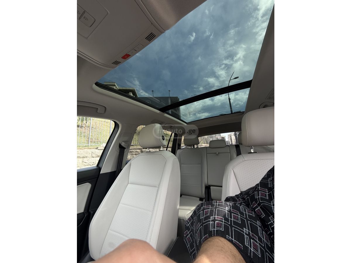 Volkswagen Tiguan - фото 7