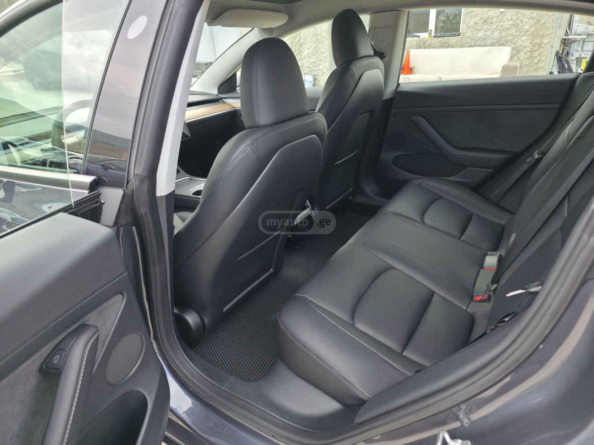 Tesla Model 3 - фото 12