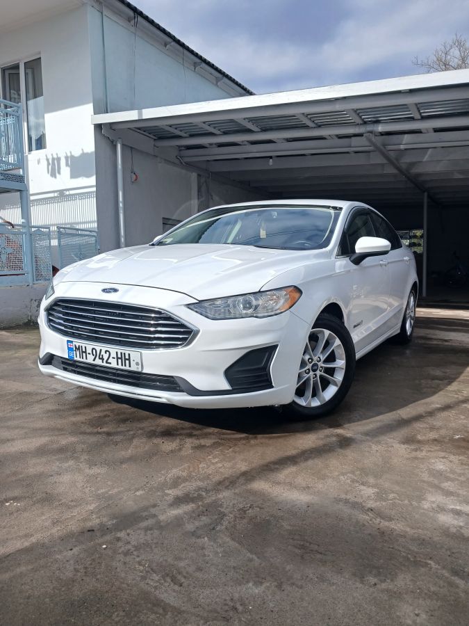 Ford Fusion - фото 7