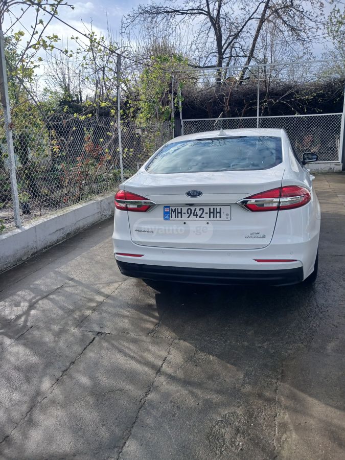 Ford Fusion - фото 8