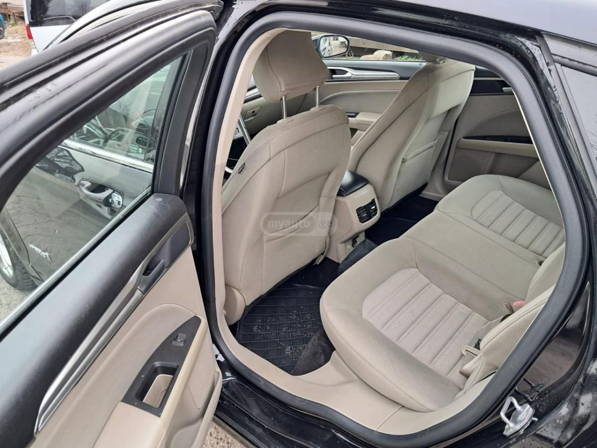 Ford Fusion - фото 11