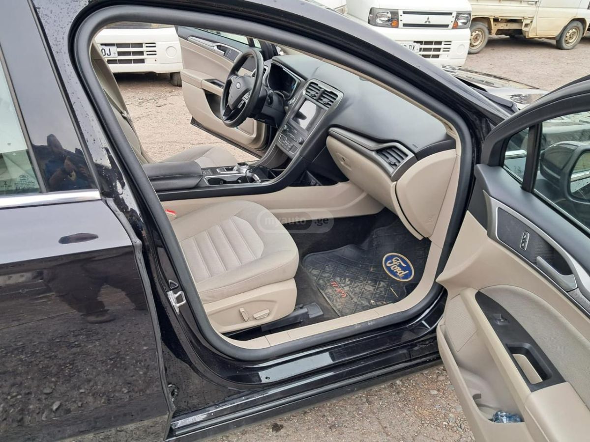 Ford Fusion - фото 7