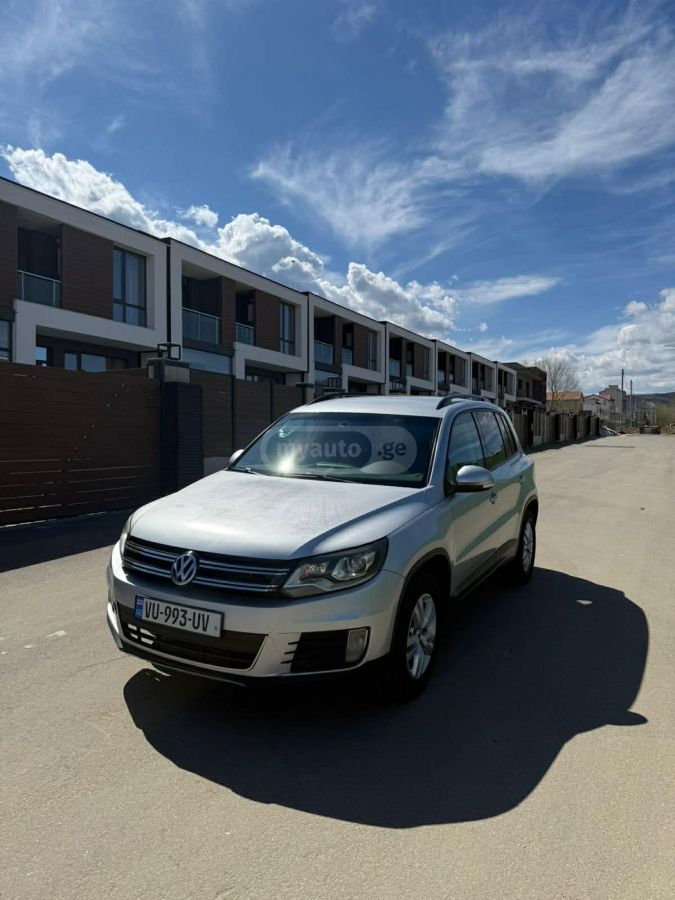 Volkswagen Tiguan - фото 1