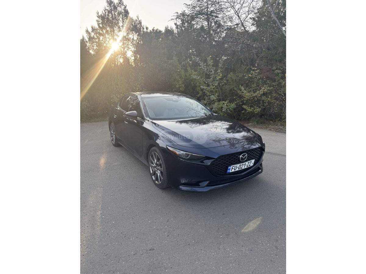 Mazda Mazda 3 - фото 1