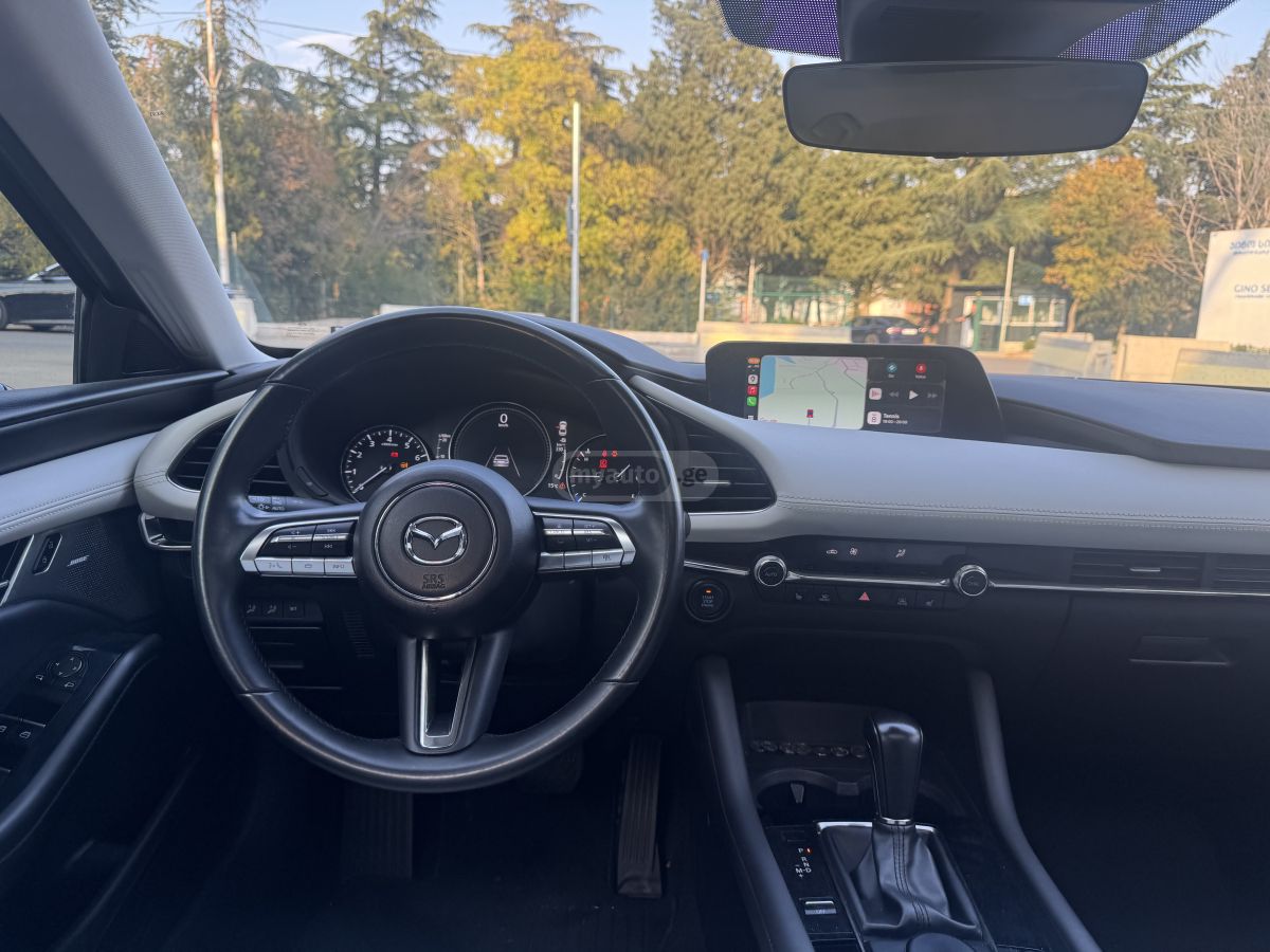 Mazda Mazda 3 - фото 7