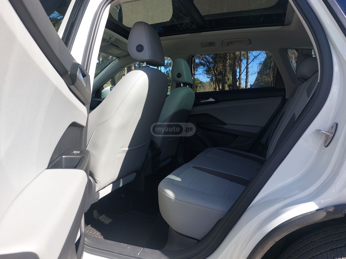 Volkswagen Taos - фото 11