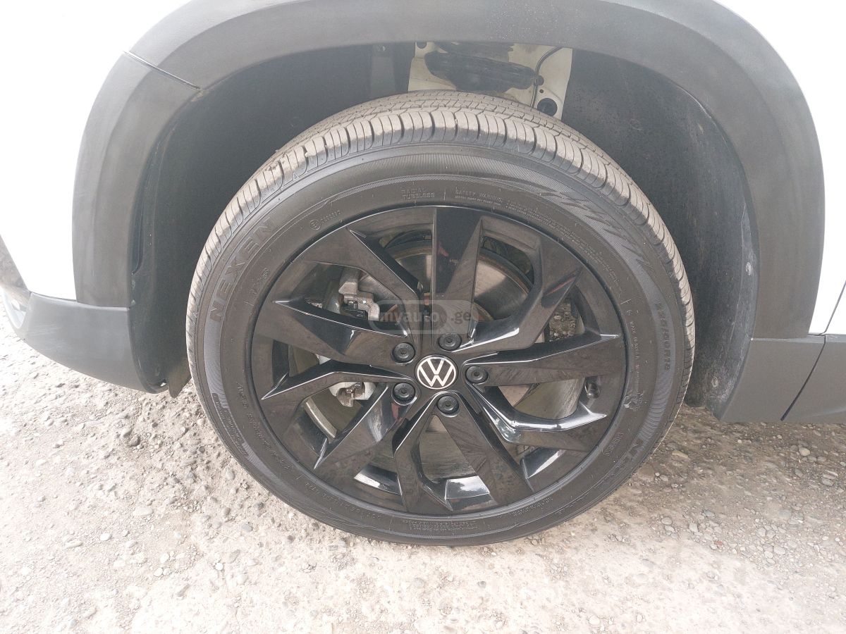 Volkswagen Taos - фото 12