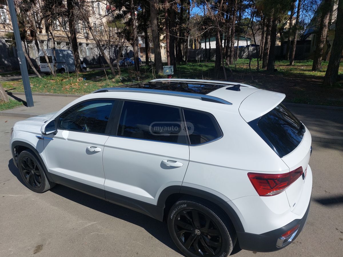 Volkswagen Taos - фото 8