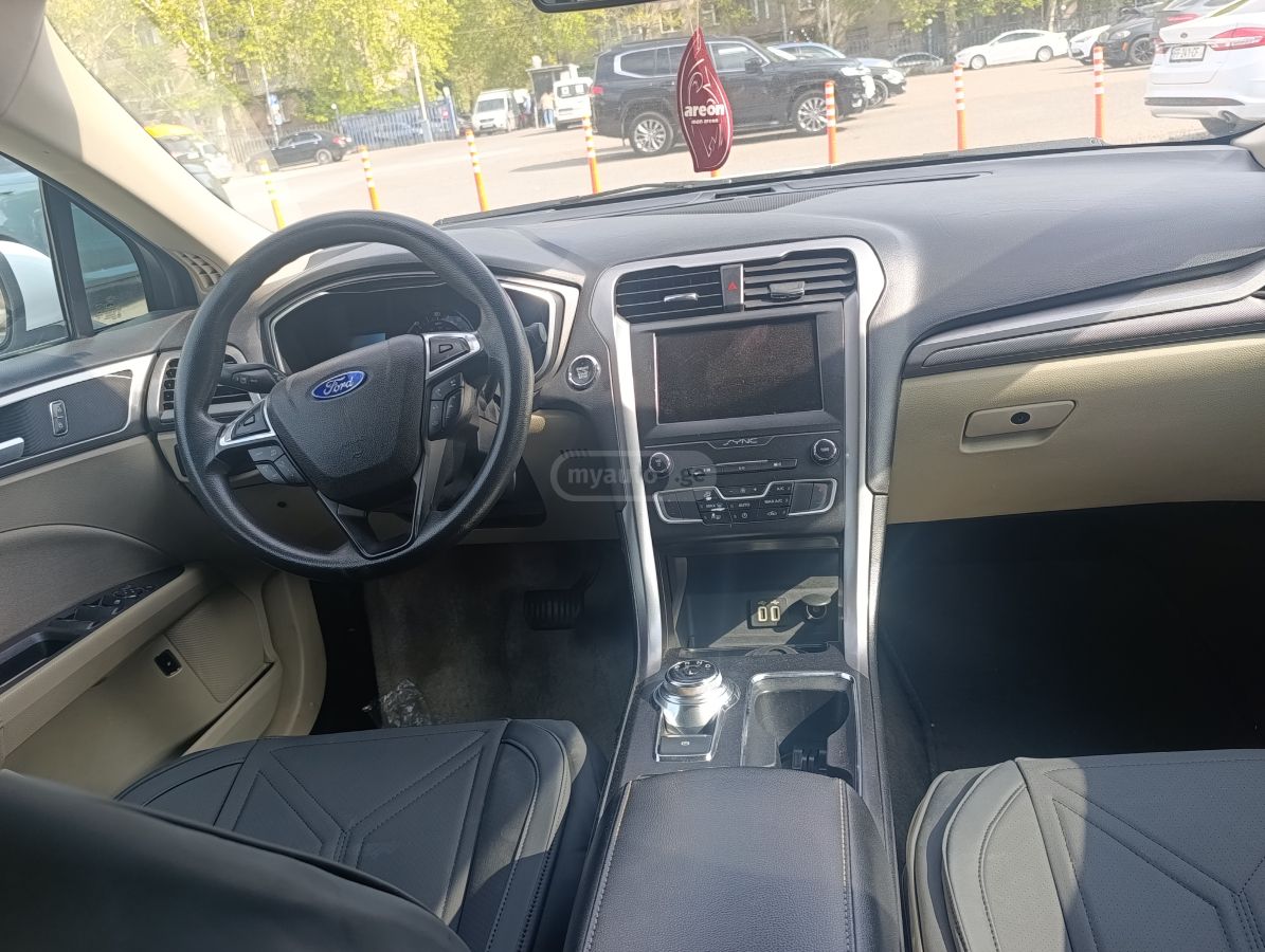 Ford Fusion - фото 7