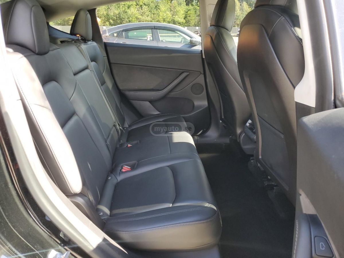 Tesla Model Y - фото 7