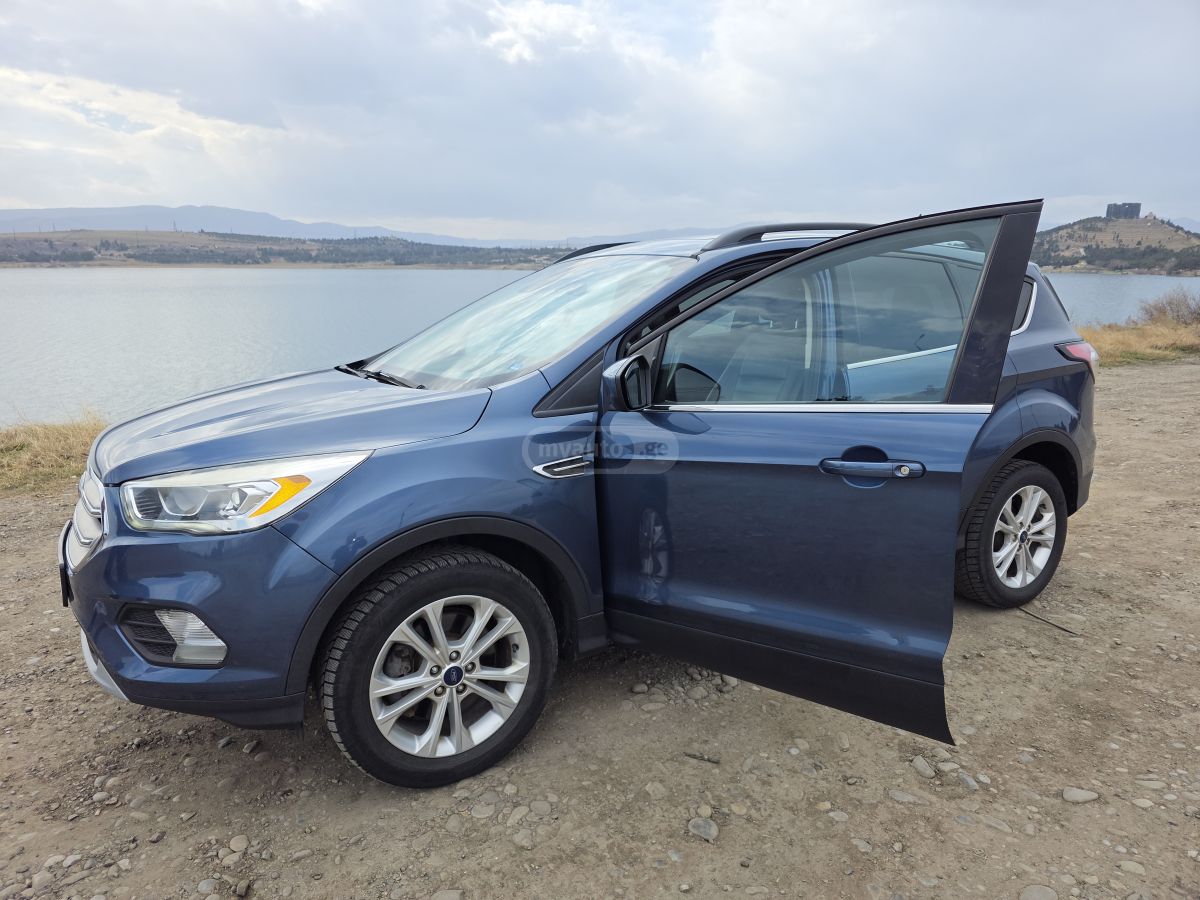 Ford Escape - фото 1