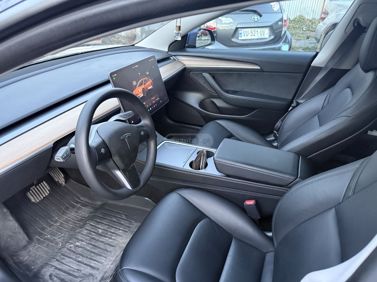 Tesla Model 3 - фото 6