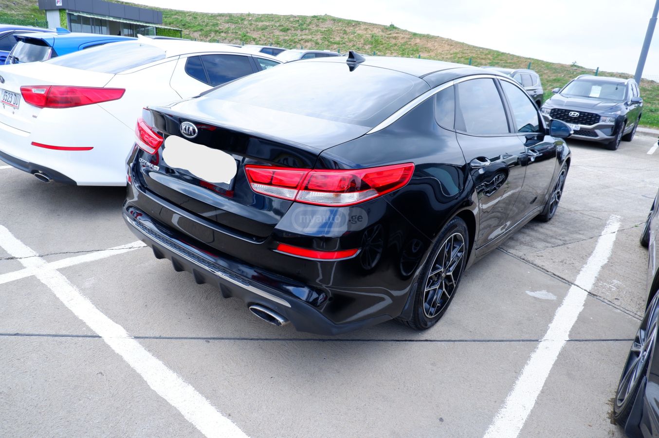 Kia Optima - фото 5