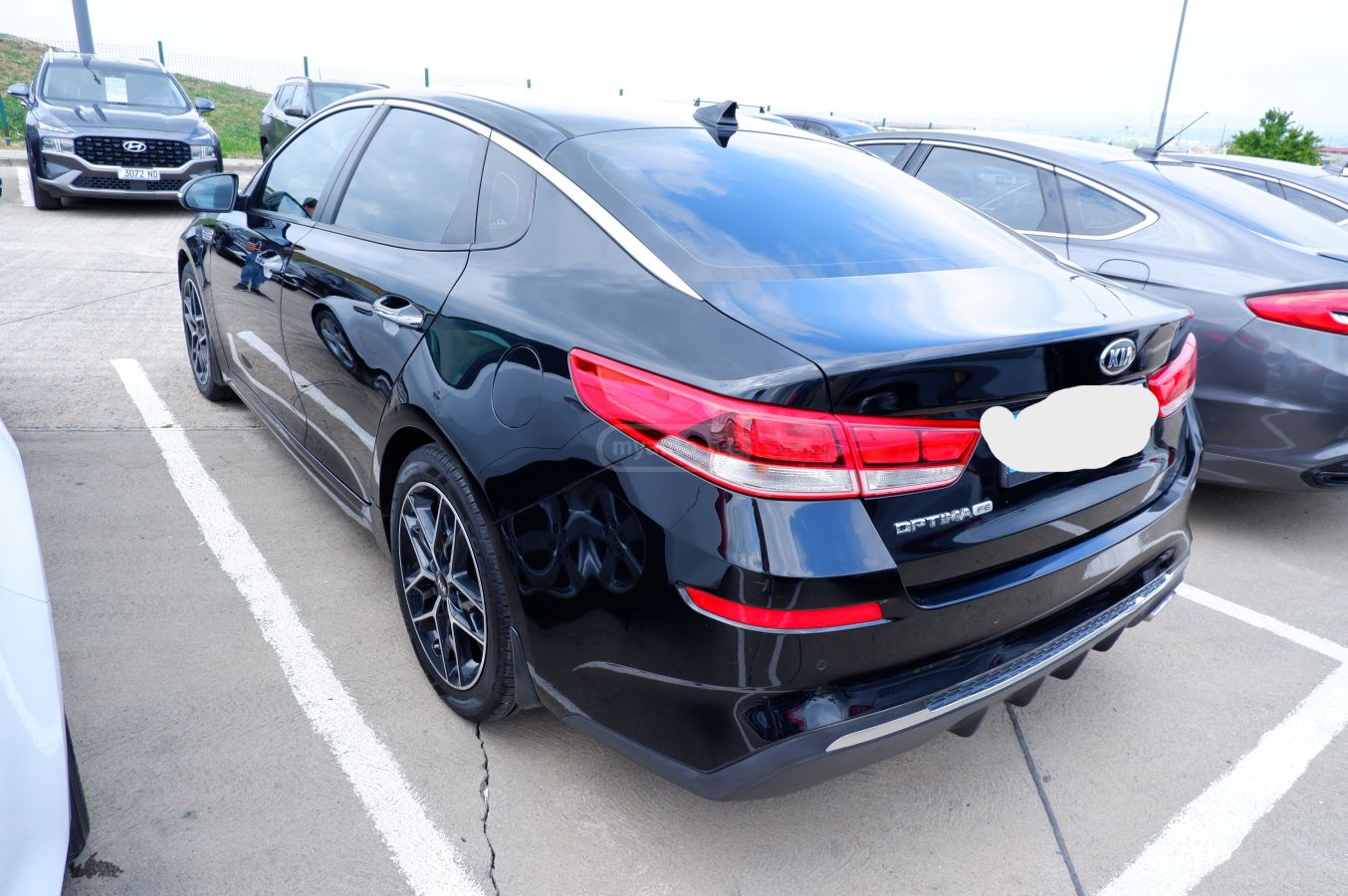 Kia Optima - фото 7