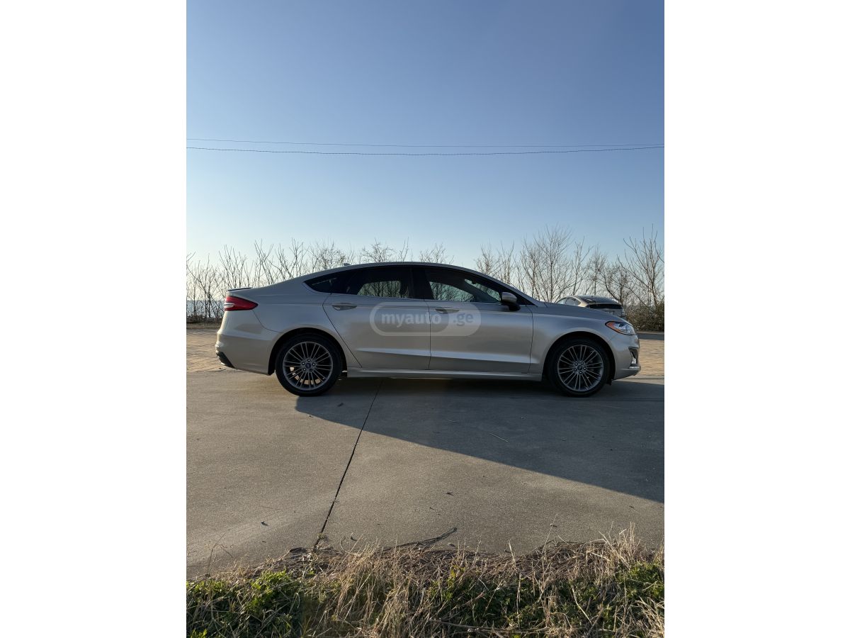 Ford Fusion - фото 10