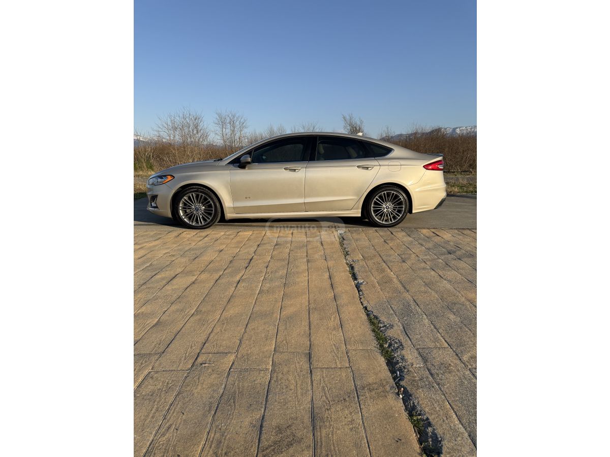 Ford Fusion - фото 6