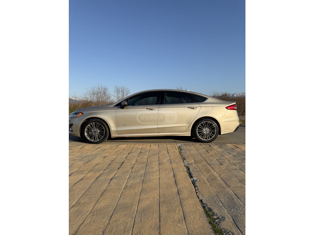 Ford Fusion - фото 7