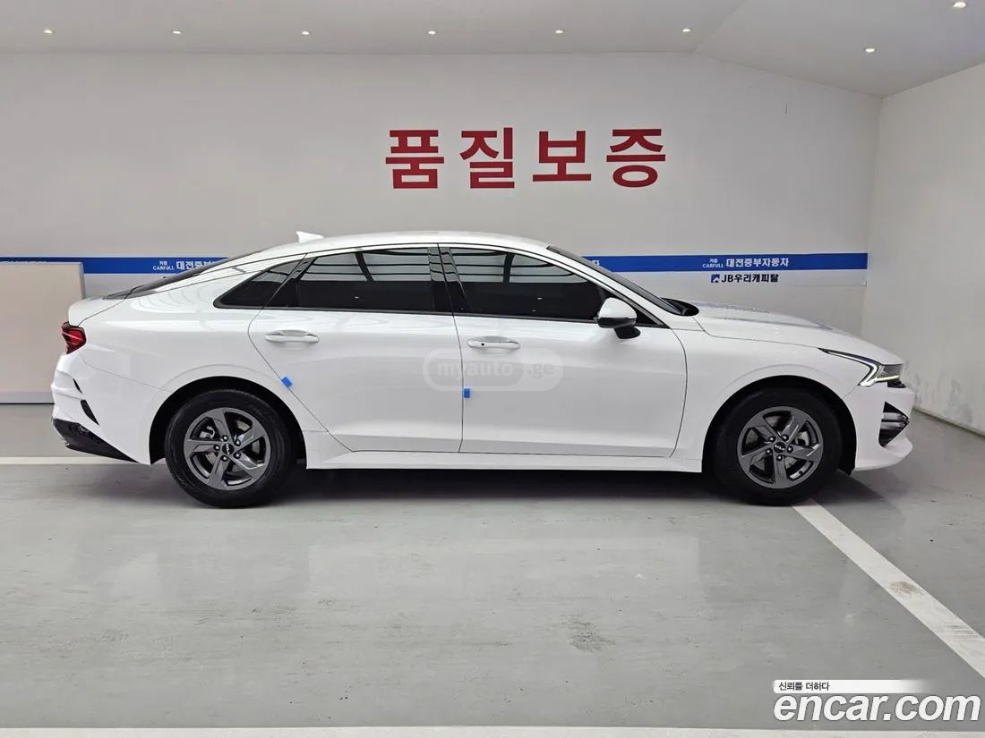 Kia Optima - фото 6