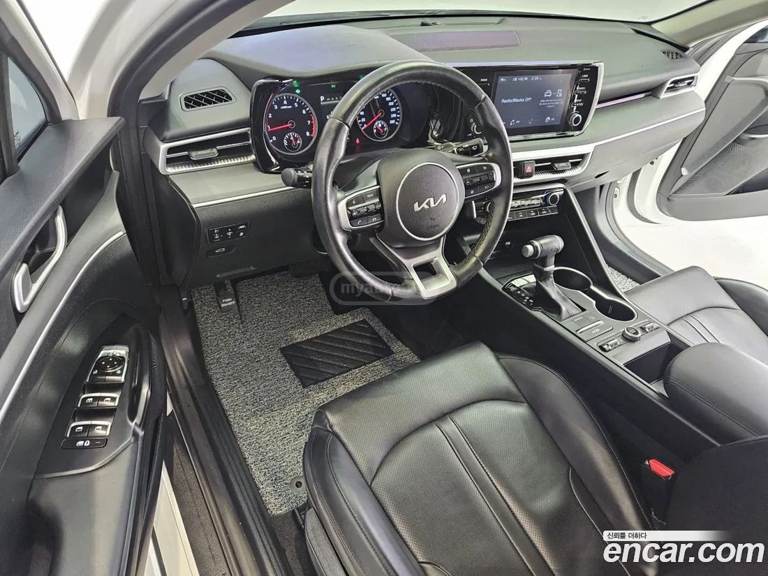 Kia Optima - фото 8