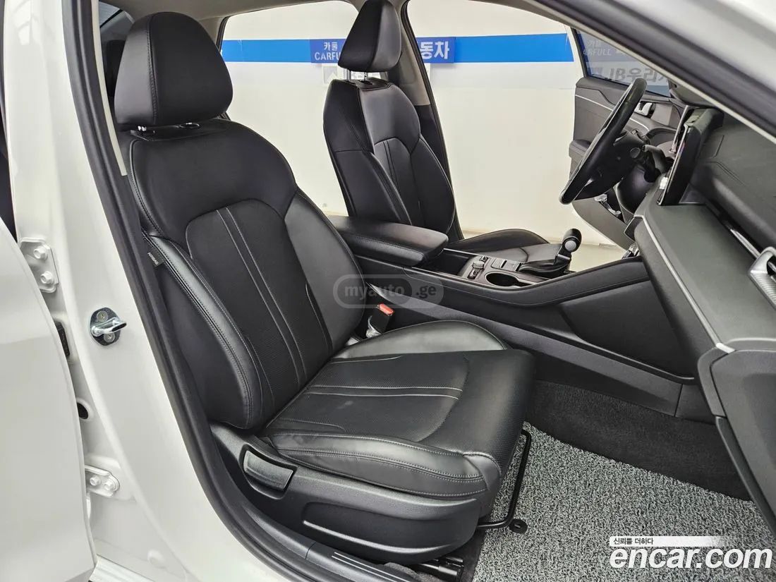 Kia Optima - фото 9