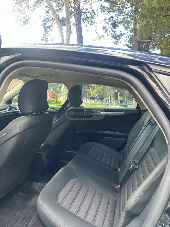 Ford Fusion - фото 7