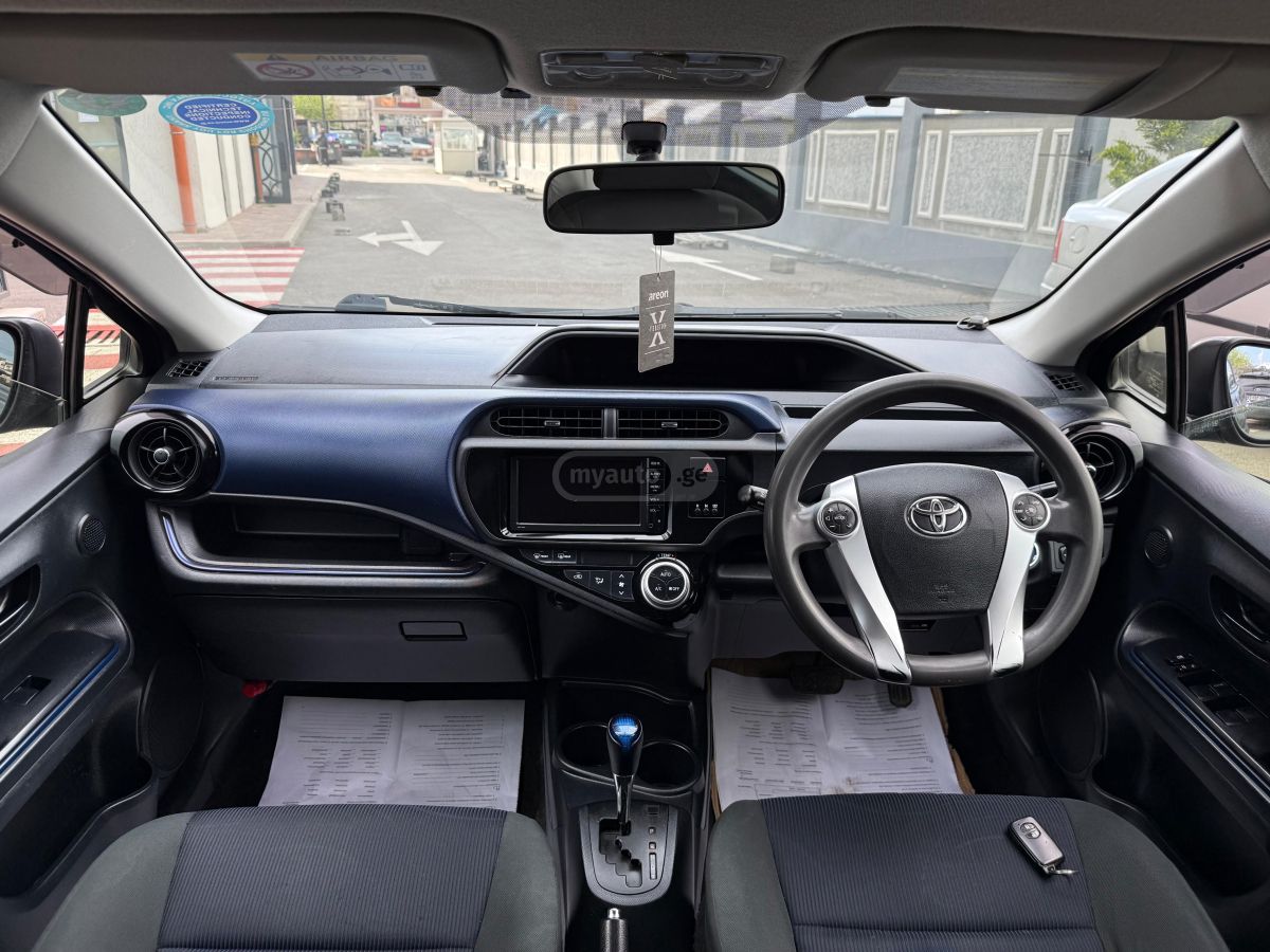 Toyota Aqua - фото 11