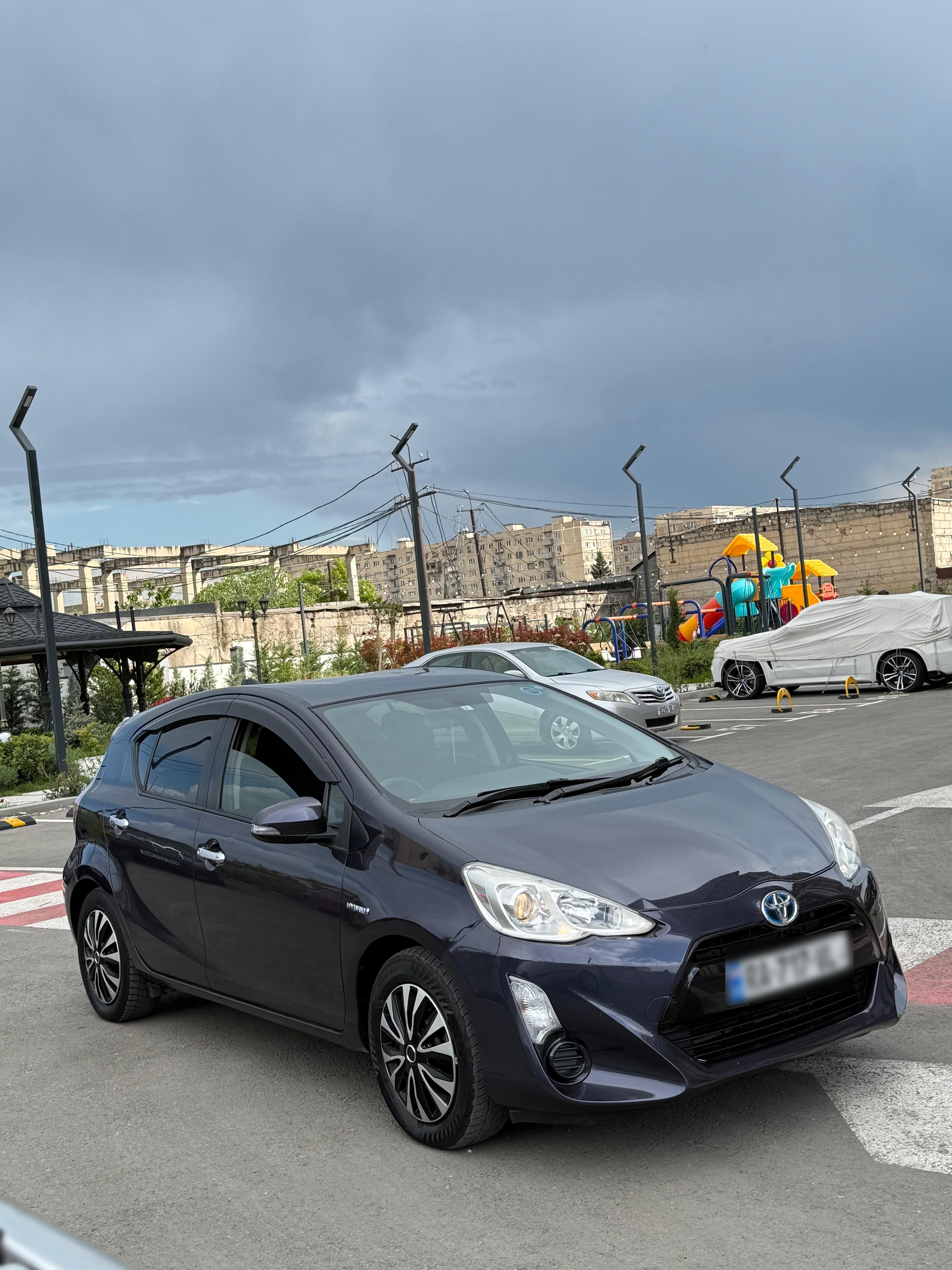 Toyota Aqua - фото 5