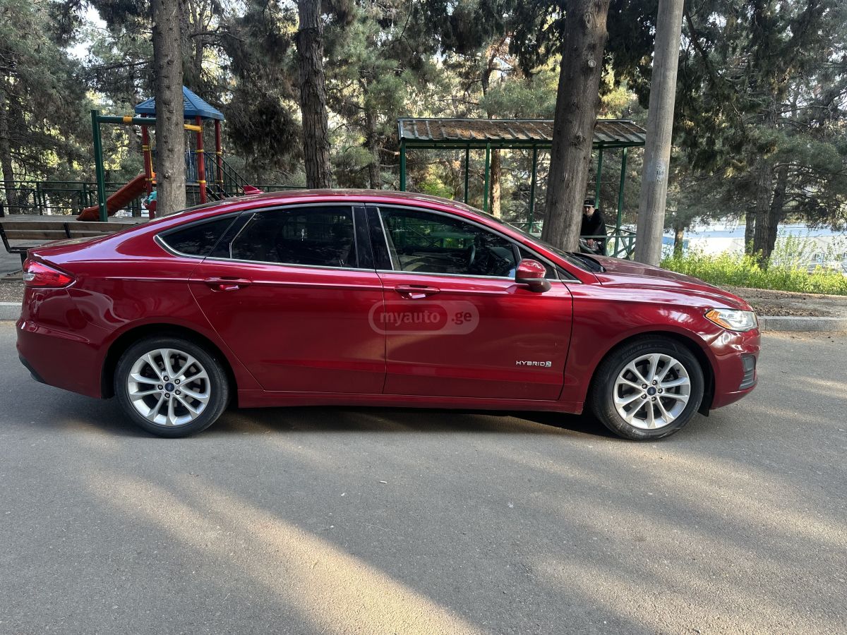 Ford Fusion - фото 8