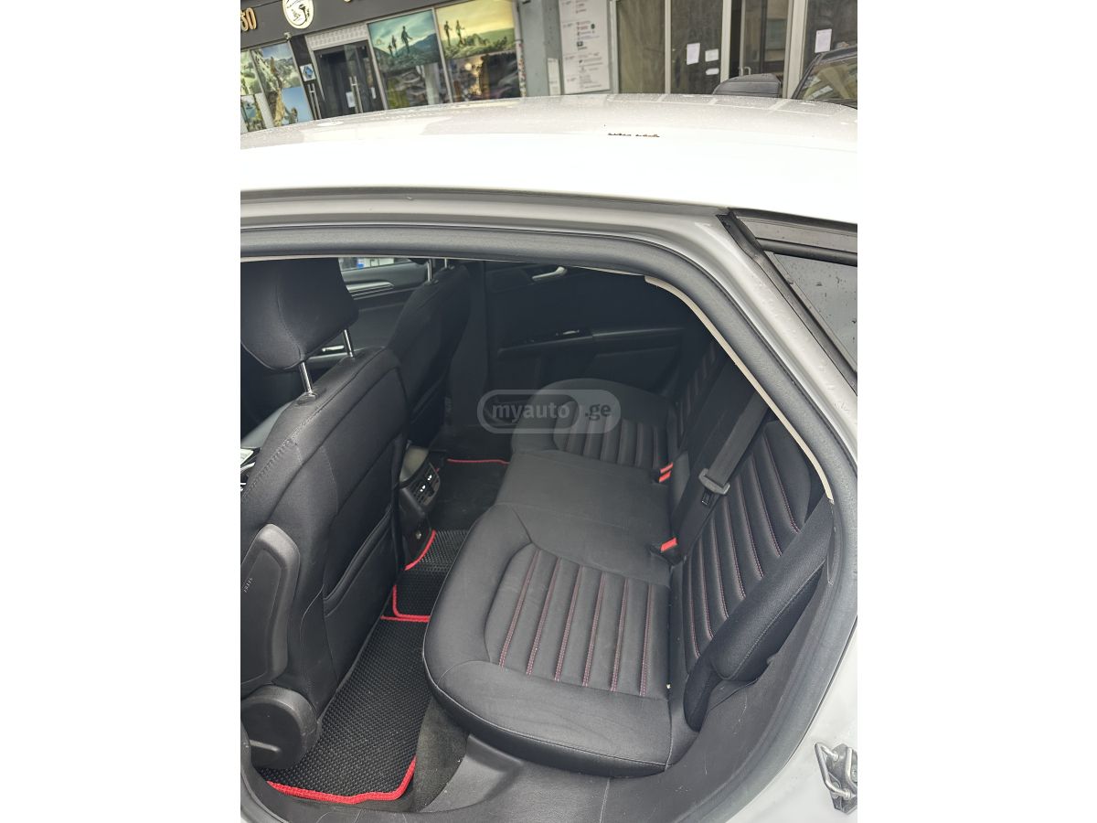 Ford Fusion - фото 5