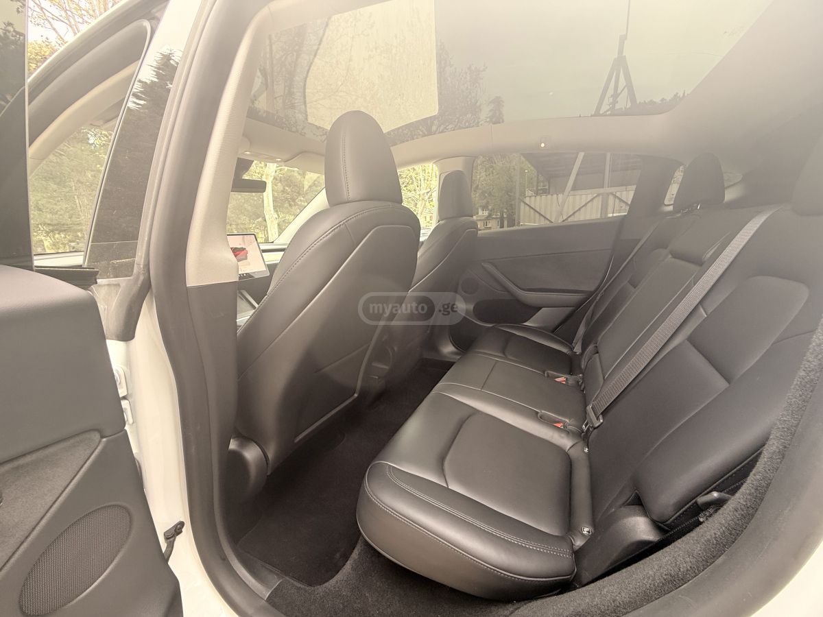 Tesla Model Y - фото 8