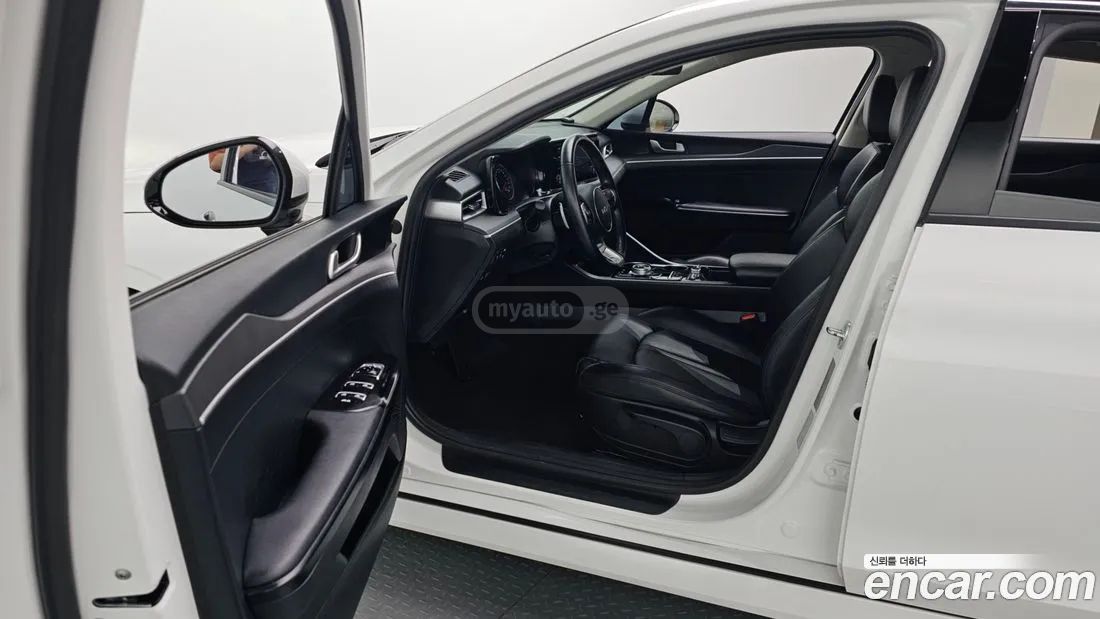 Kia Optima - фото 10