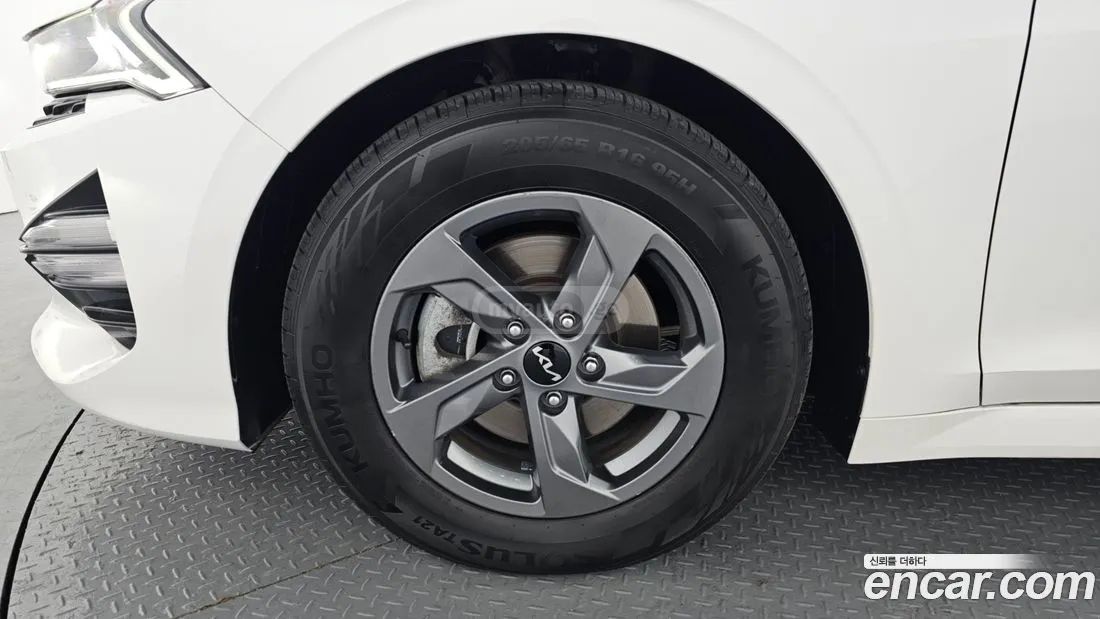 Kia Optima - фото 5