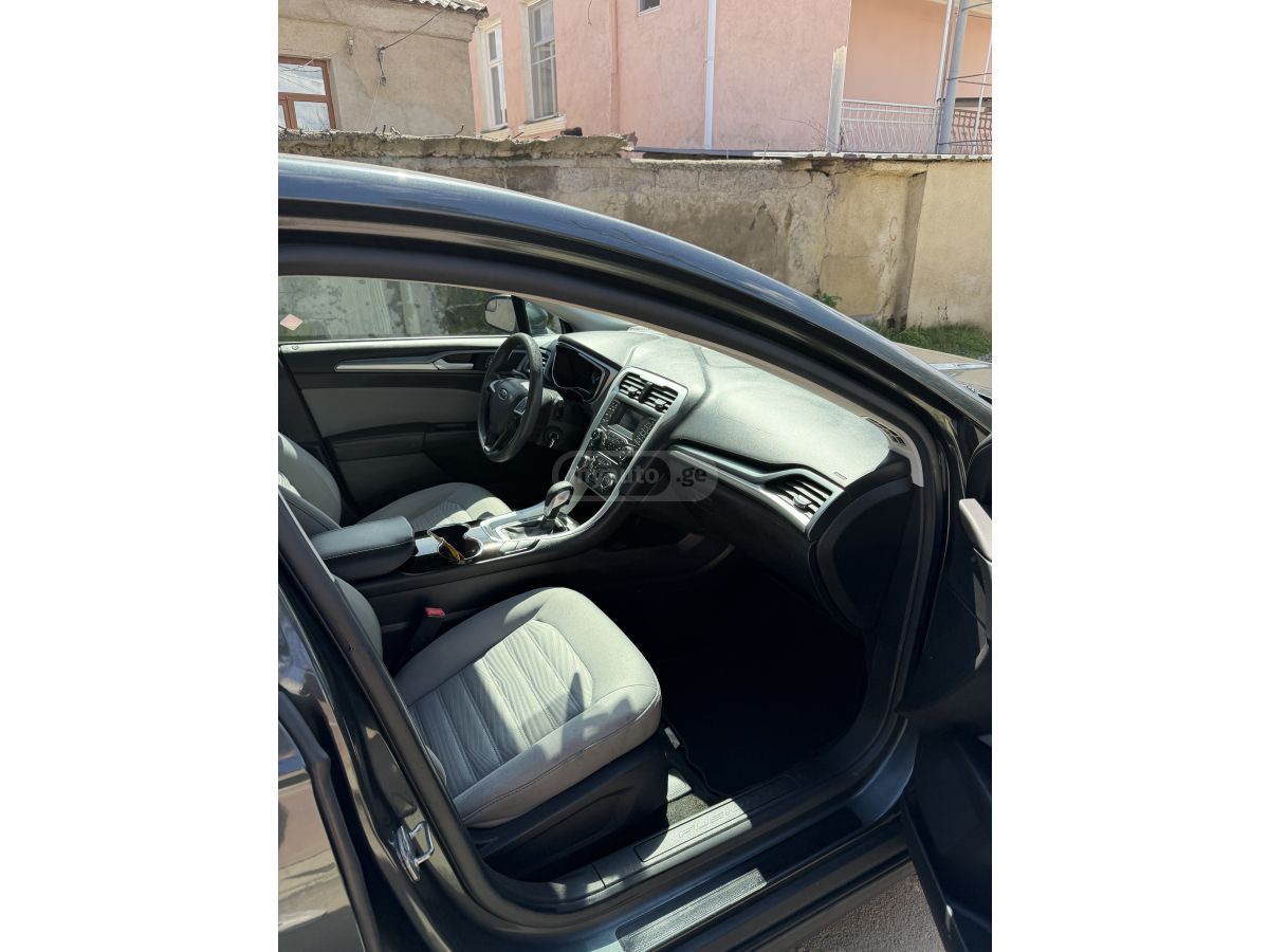 Ford Fusion - фото 7