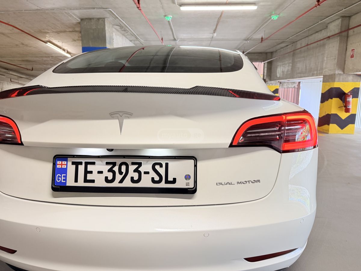 Tesla Model 3 - фото 10