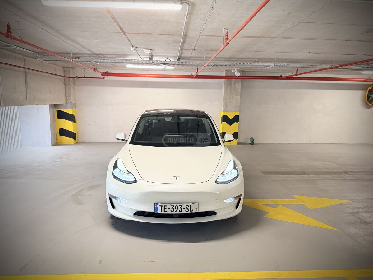 Tesla Model 3 - фото 8