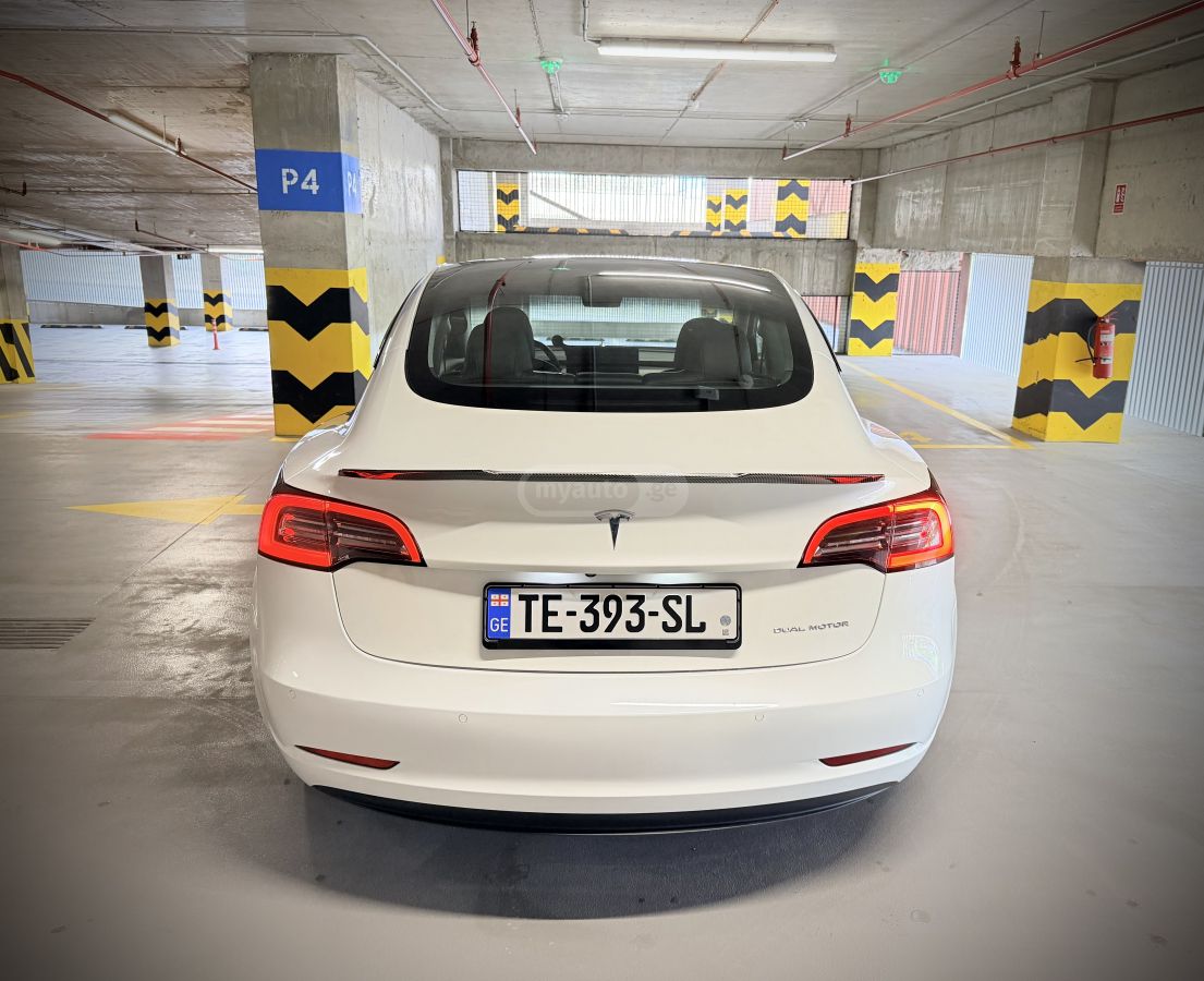 Tesla Model 3 - фото 9