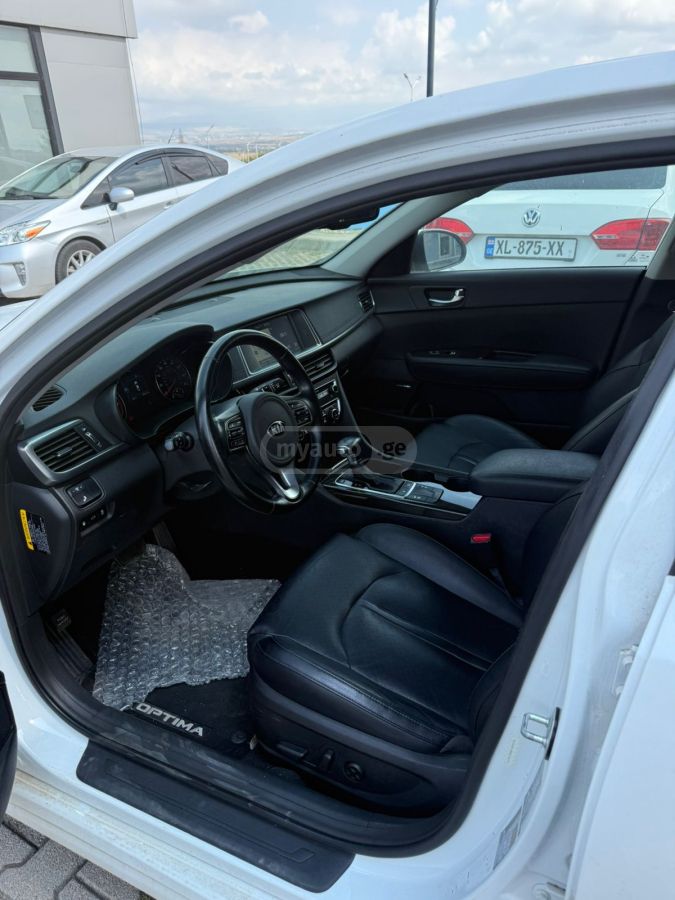 Kia Optima - фото 4