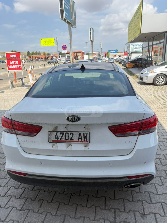 Kia Optima - фото 7