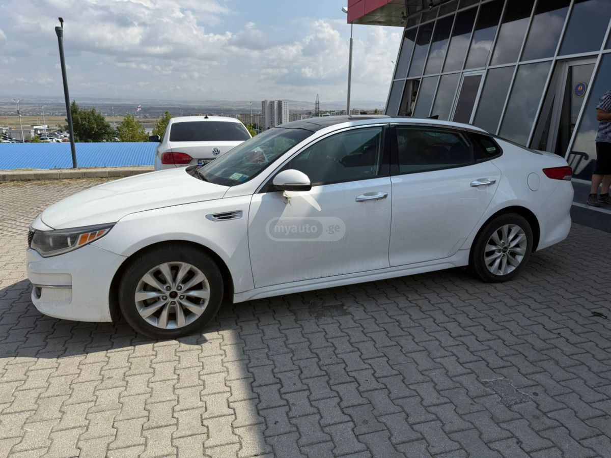 Kia Optima - фото 8