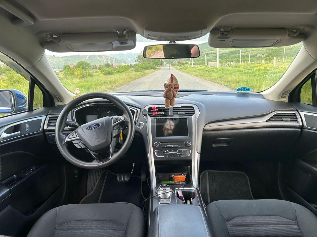 Ford Fusion - фото 12