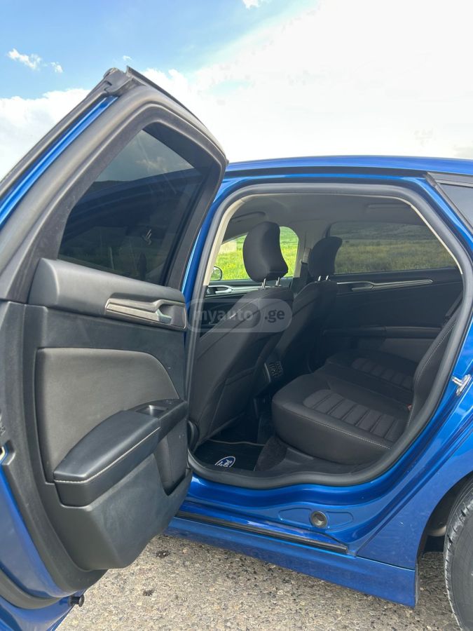 Ford Fusion - фото 14