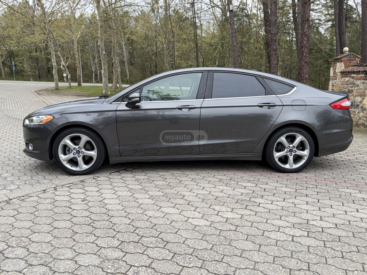 Ford Fusion - фото 7