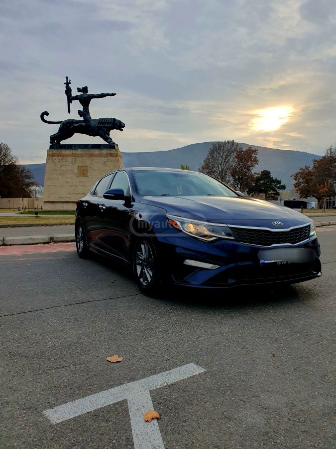 Kia Optima - фото 4