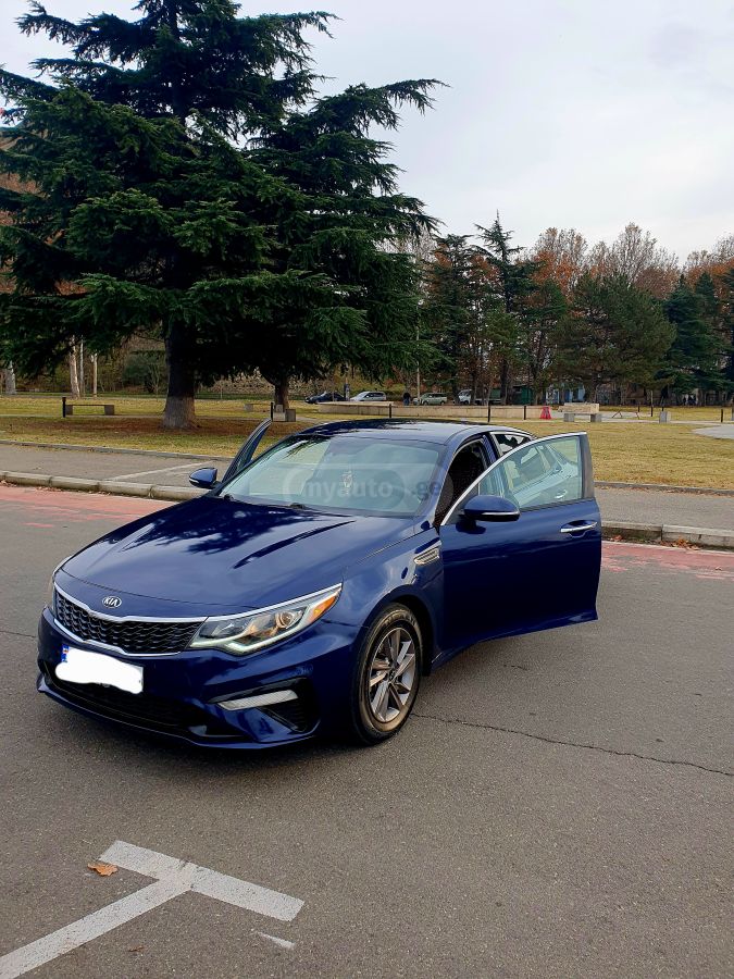 Kia Optima - фото 5