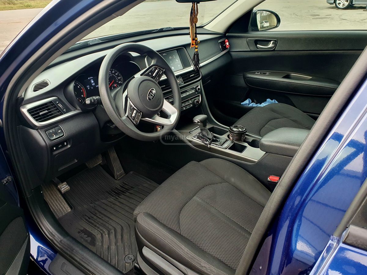 Kia Optima - фото 6