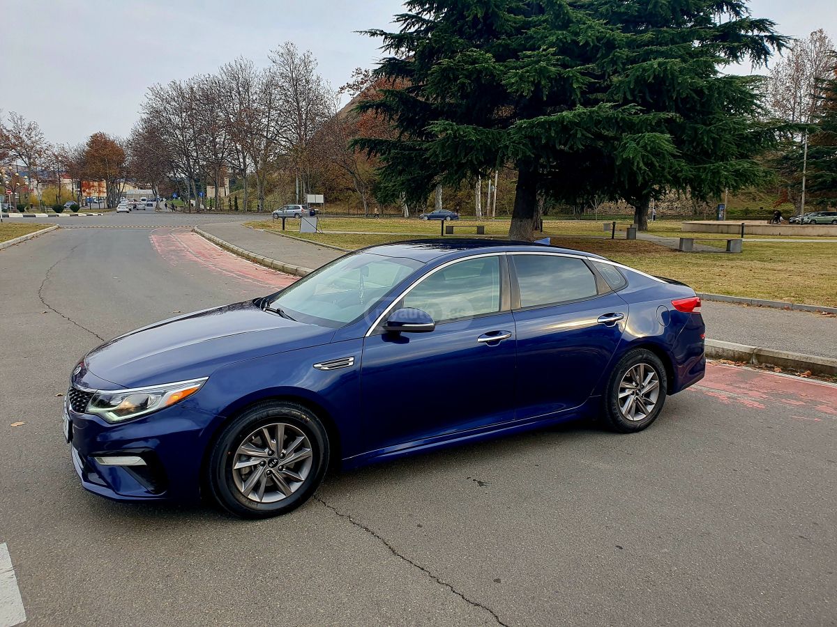 Kia Optima - фото 7