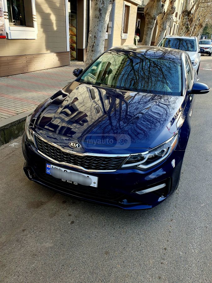 Kia Optima - фото 8