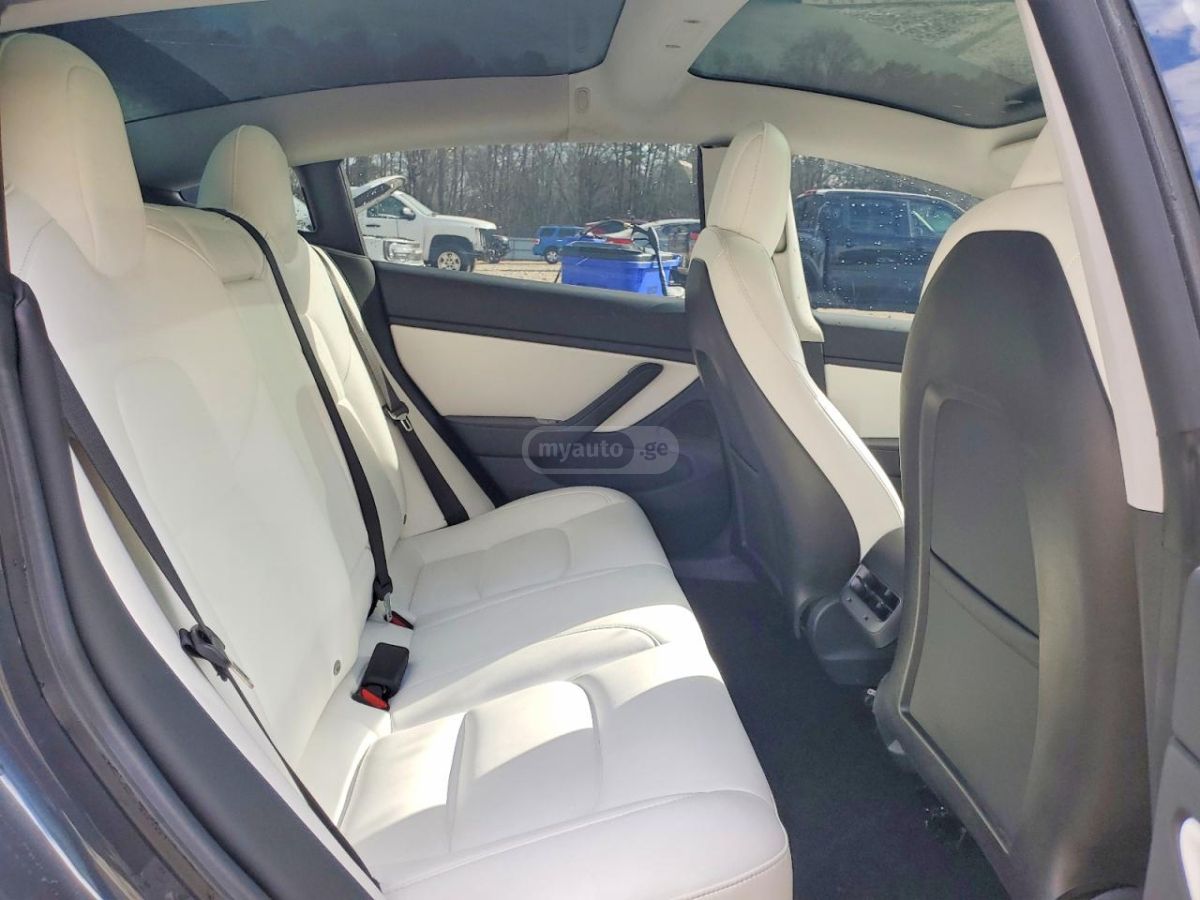 Tesla Model 3 - фото 10