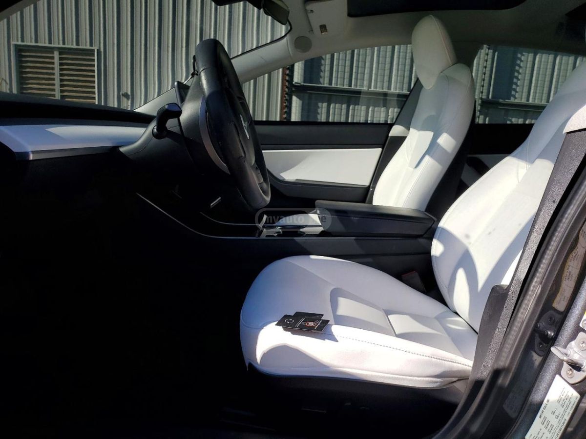 Tesla Model 3 - фото 7